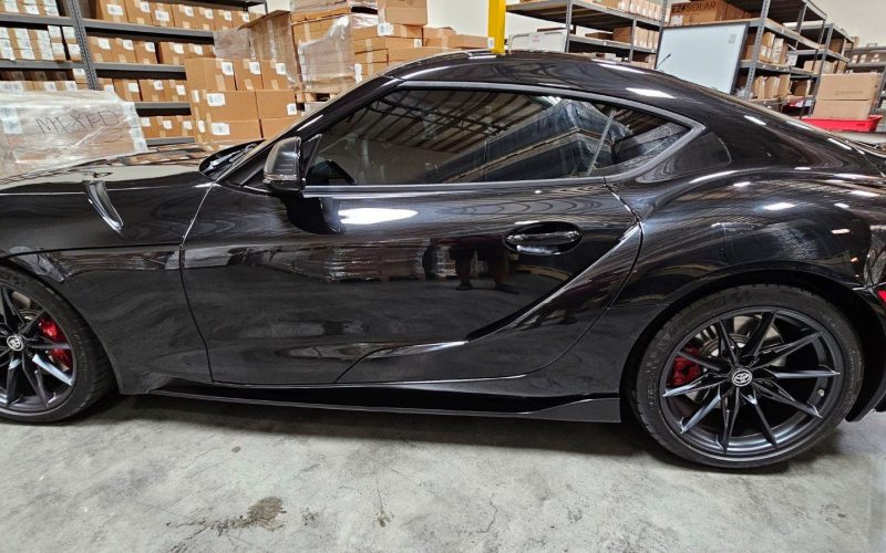 Black sports car tint by 702 tint